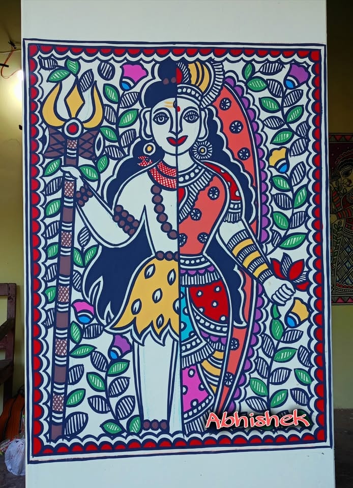 Ardhanarishvara — Shiva and Parvati as one, framed in foliage