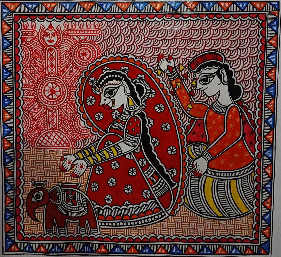 Bride with a ceremonial elephant in the traditional red-and-black palette