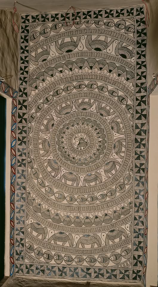 Godna-style mandala of elephants, fish and peacocks in natural monochrome