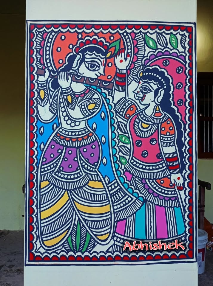 Krishna with his flute and Radha, painted on a home pillar